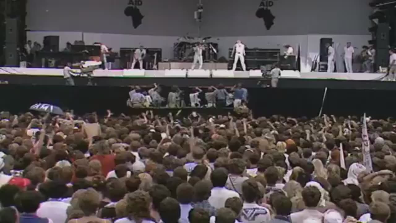 Freddie Mercury at Live Aid in front of 72000 people in Wembley Stadium 7/13/1985.