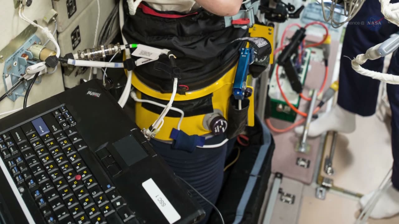 Science Casts Horn-rims and Funny Stockings on the Space Station