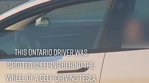 THIS ONTARIO DRIVER WASSPOTTED SLEEPING BEHIND THEWHEEL OF A SELF-DRIVING TESLAON THE OEW