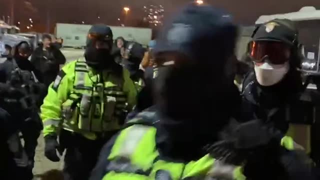 These cops paid from your money, in riot gear doing a round in a place where there is no riot