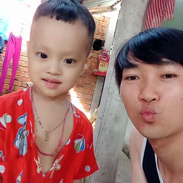 Baby smiles innocently