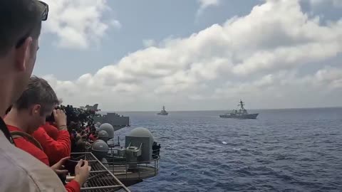 Navy F_A-18 Breaking The Sound Barrier Over Water_1