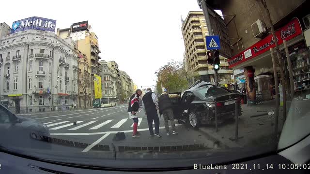 BMW Fleeing From Police Loses Control and Crashes