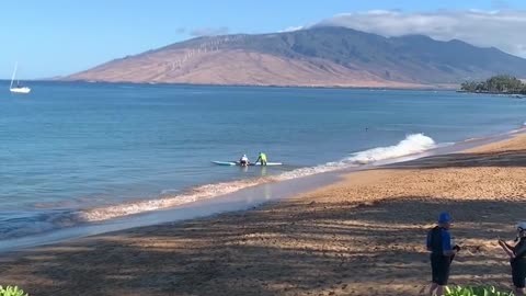 lashback of a Maui morning with a calm beach