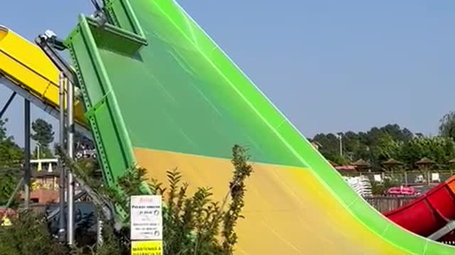 Guy Wipes Out on Innertube Slide