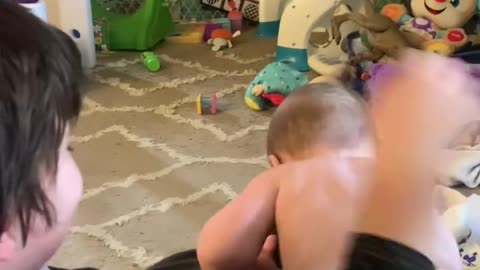 Baby misses his brother, brother comes back