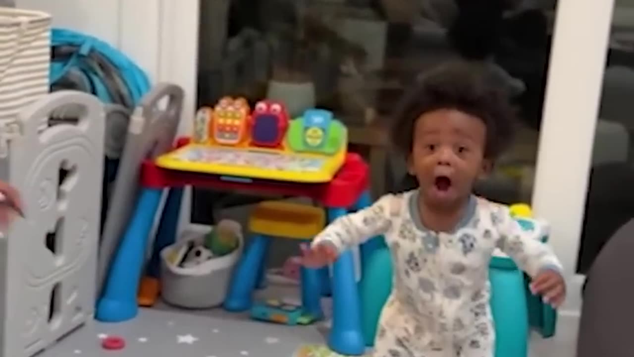 Super excited toddler cannot believe he can walk