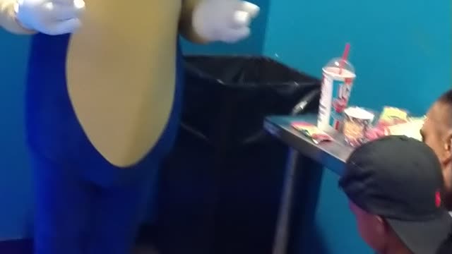 Houston mascot party character sonic plays metal sonic down the ramp through the warp ring game