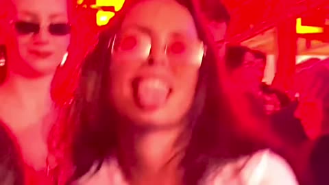 Bomb girl dancing in edm Techno Party