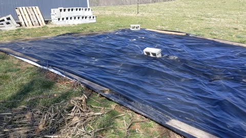 No garden weeds using a silage tarp