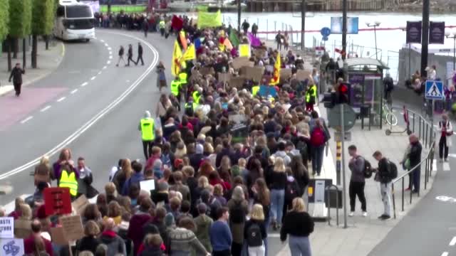 Thunberg urges global strikes to 'uproot the system'