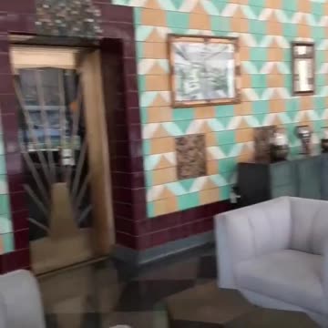 Lobby In Hotel, Before Speech Pan.