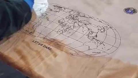 Applying oil finish to Military plaque
