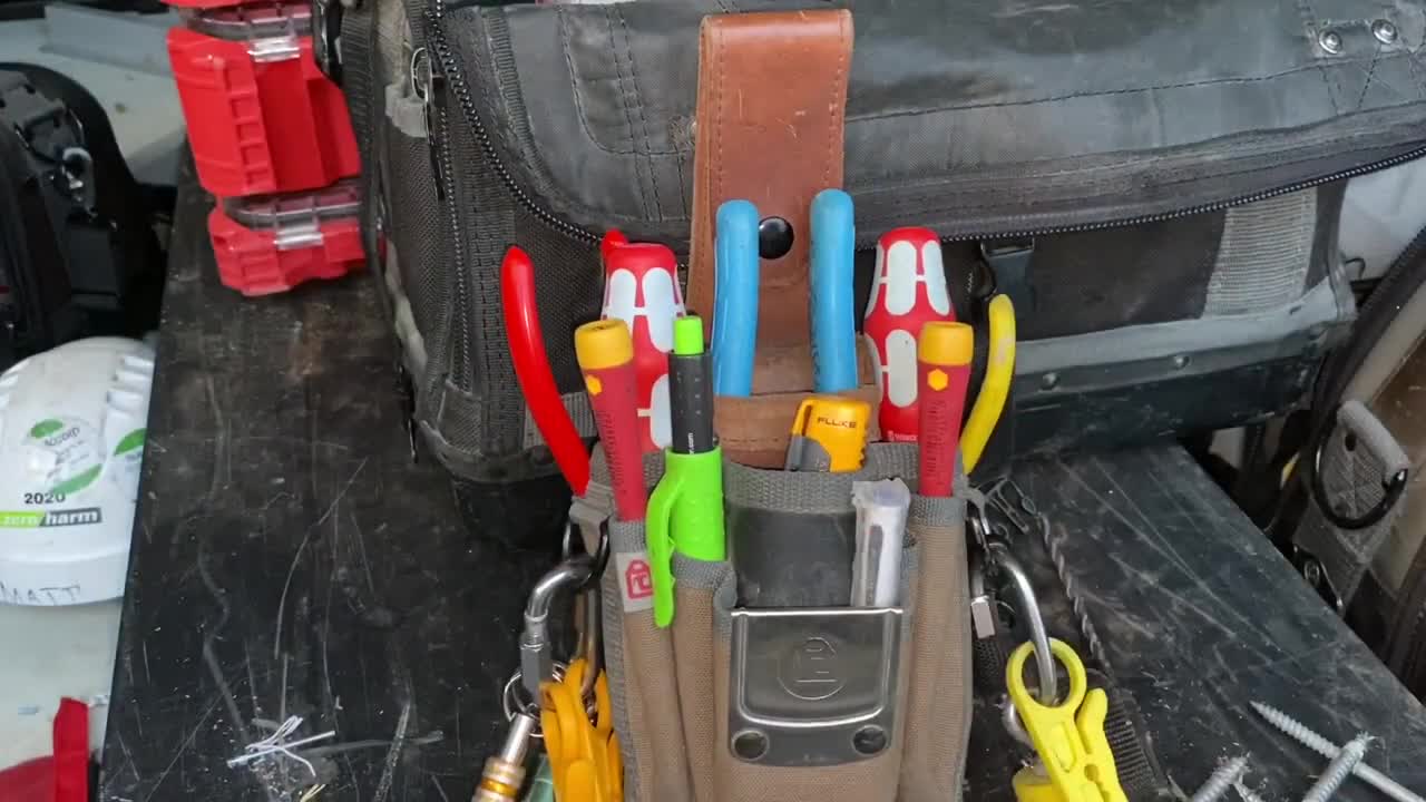 Explaining my veto bag and pouch setup for work.