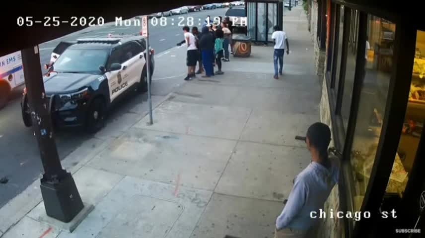 Bystanders Argue with Police Officers, Ambulance Arrives - Surveillance Video