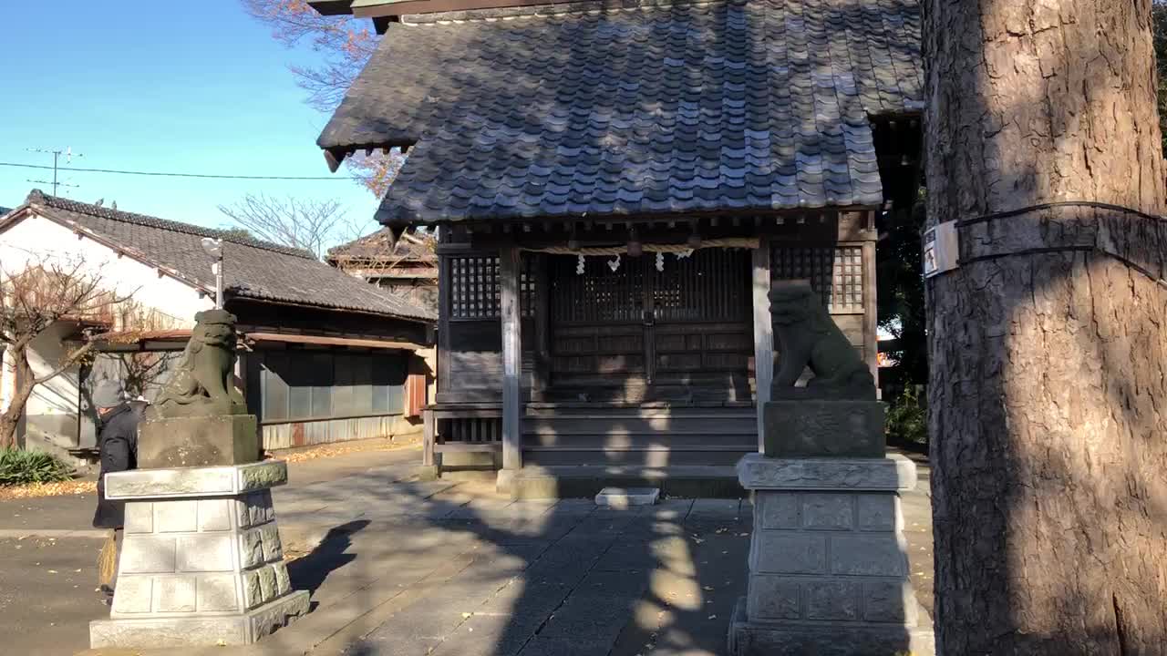 Cleaning the shrine grounds Japan