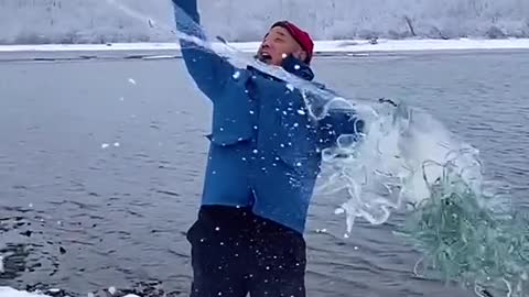 They were standing in the river spearing fish.