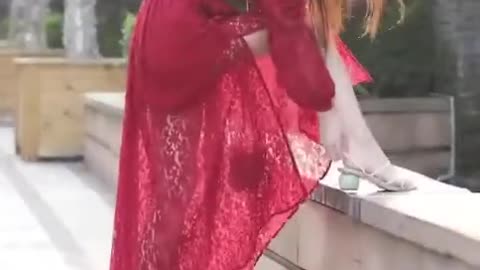 Hot girl model in red dress 