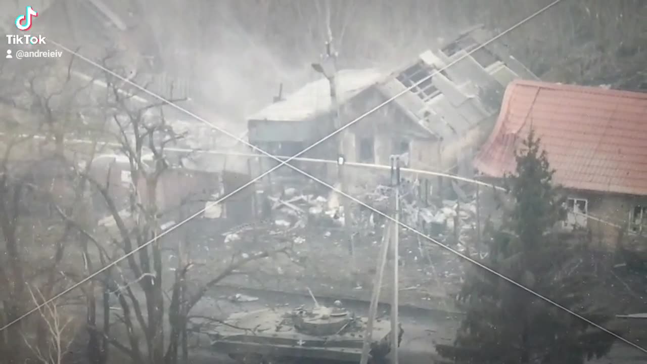 Ukrainian BTR Fires Across a Road in Eastern Bakhmut