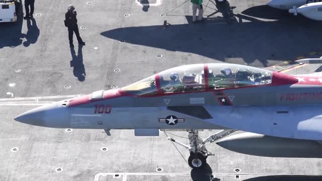 READY FOR TAKEOFF: US Naval Crews Perform Flight Operations Aboard The USS Nimitz Supercarrier