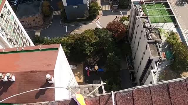 Painting High Above the City