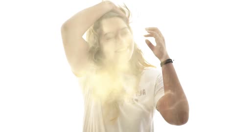 Double exposure video of a woman and a waterfall