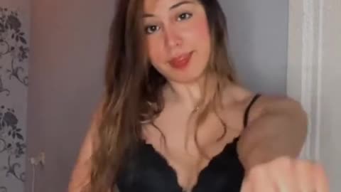 Sexy Girl in black dress dancing