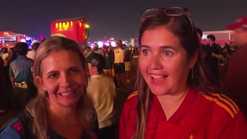 Spanish fans celebrate their 7-0 thrashing of Costa Rica. Olmo scored Spain's 100th World Cup goal