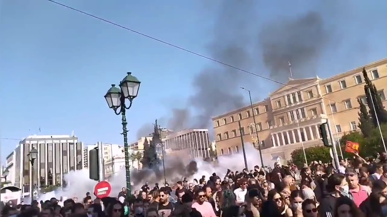 Molotov cocktails rain down in front of the parliament in Athens