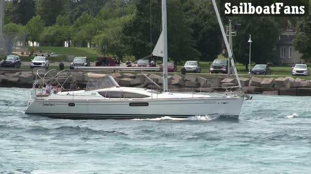 Seafari Sailboat Cruising Up St Clair River In Great Lakes