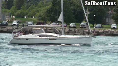 Seafari Sailboat Cruising Up St Clair River In Great Lakes