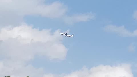 plane zooming from the sky by Tecno camon19