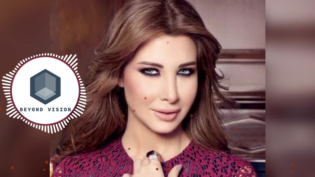 Nancy_Ajram - 3am Bet3alla2 Feek