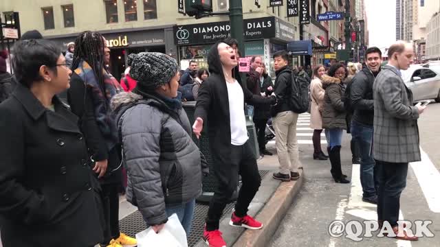 This guy is singing and dancing in public like crazy!!! So funny