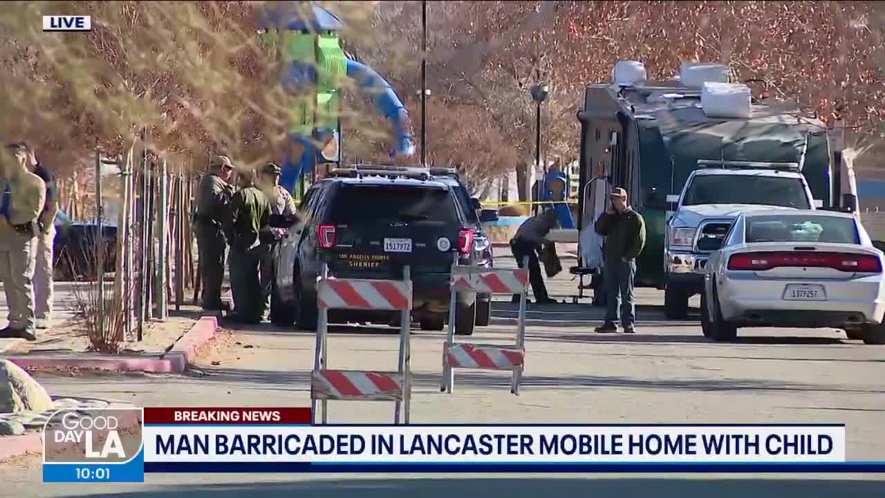 Man barricaded inside Lancaster home with child