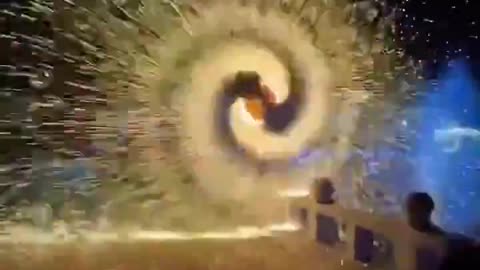 Mesmerizing Catherine wheel effect from steel wool