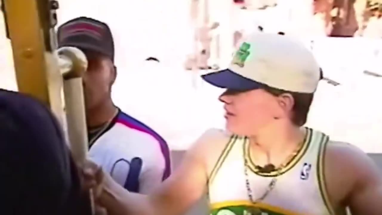 Mark Wahlberg rides a cable car and drops bars in the city, 1991