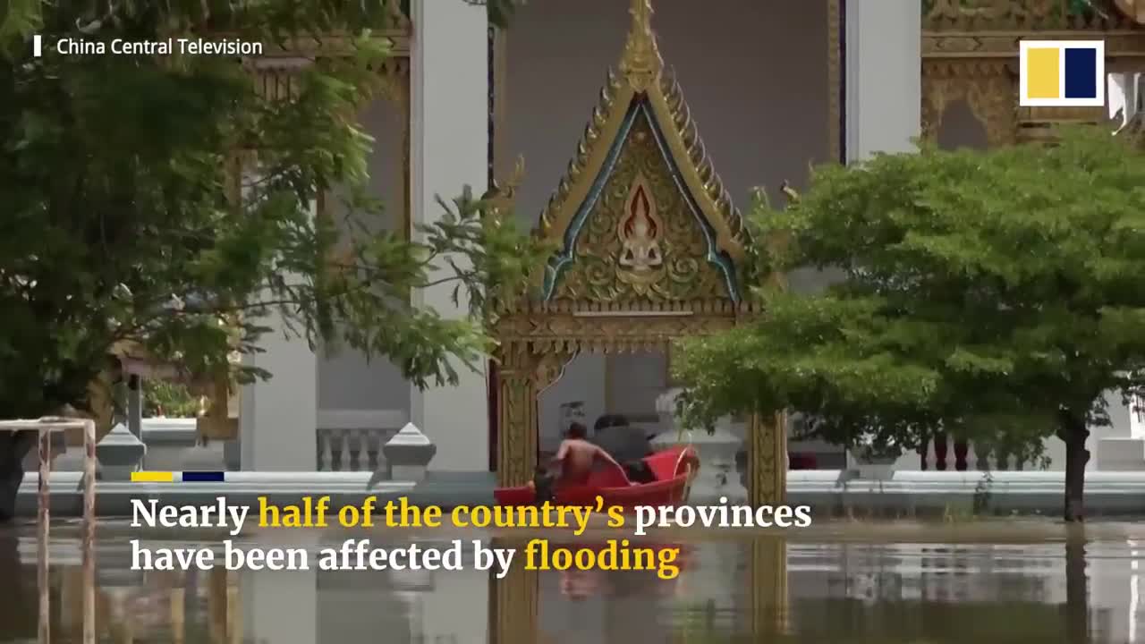 Diners in Thailand enjoy meal in flooded restaurant amid heavy rain season