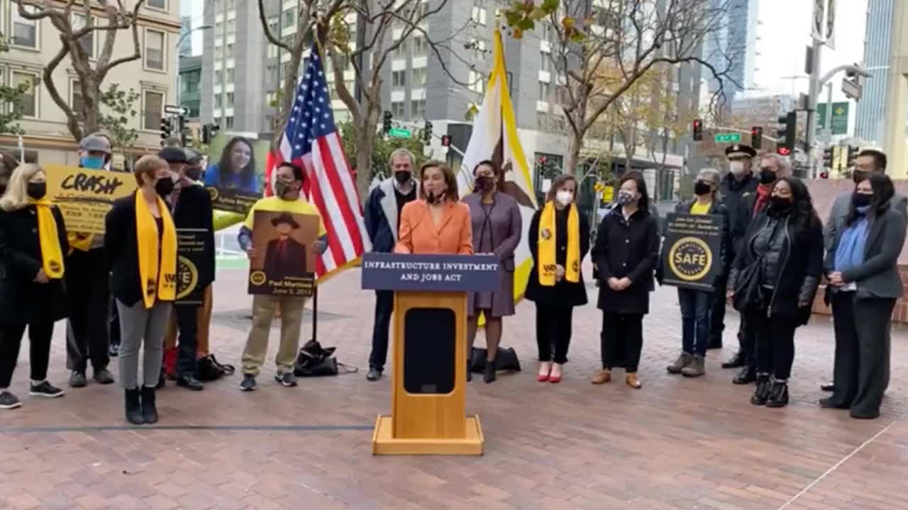 Man shouts LET'S GO BRANDON at Nancy Pelosi Dec. 2021