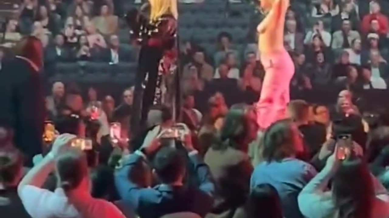 Avril Lavigne Kicks Half Naked Protestor Off Stage - Get The F**k Off, B*tch!”