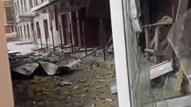 Aftermath of Ukrainian shell hitting the Druzhba hotel in center of Donetsk.