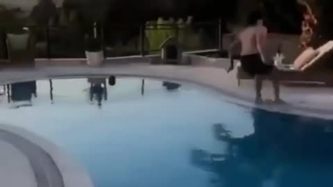 Man epic fall while jump over the swimming pool