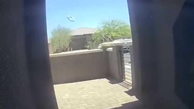 Security Camera Captures Inflatable Pool Flying Outside Their House