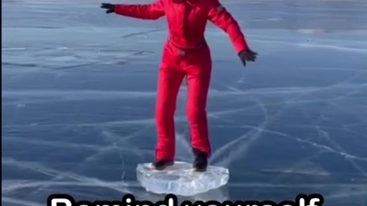 Surfing the Russian way on the surface of Lake Baikal in -40C.