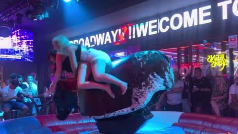 GIRL TAKE ON THE BULL! Benidorm Bull Ride. Mechanical Bull EPIC FAIL