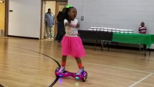 Little girl shows off hoverboard dance moves