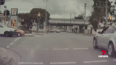 Split-second collision caught on dashcam at Greenslopes | 7NEWS