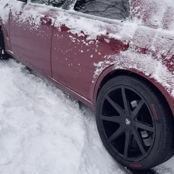 Car stuck in snowing weather