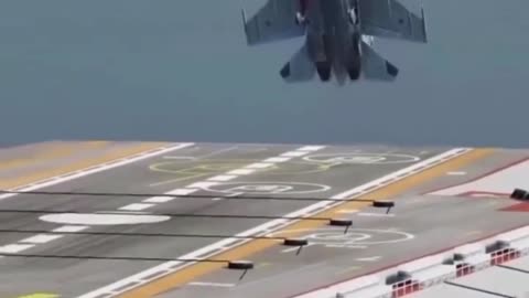 Aircraft carrier fighter jets land