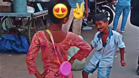 Little girl and boy dance
